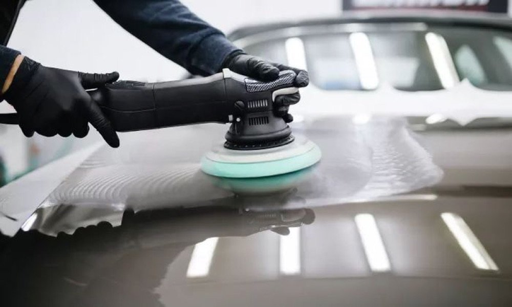 Machine polishing a car's paint